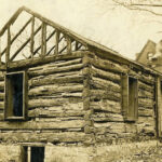 2-L.-Arriandeaux-1827-1828-log-cabin,–2nd-and-Locust-Streets,-Dubuque,-Iowa.-(John-Rider-Wallis-Collection-Dubuque-Co.-Historical-Society)(W)